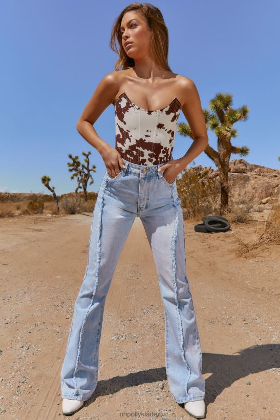 ljusblå tvätt Oh Polly kvinnor out of line fransade sömmar utsvängda ben jeans Z84F2T840 bottnar